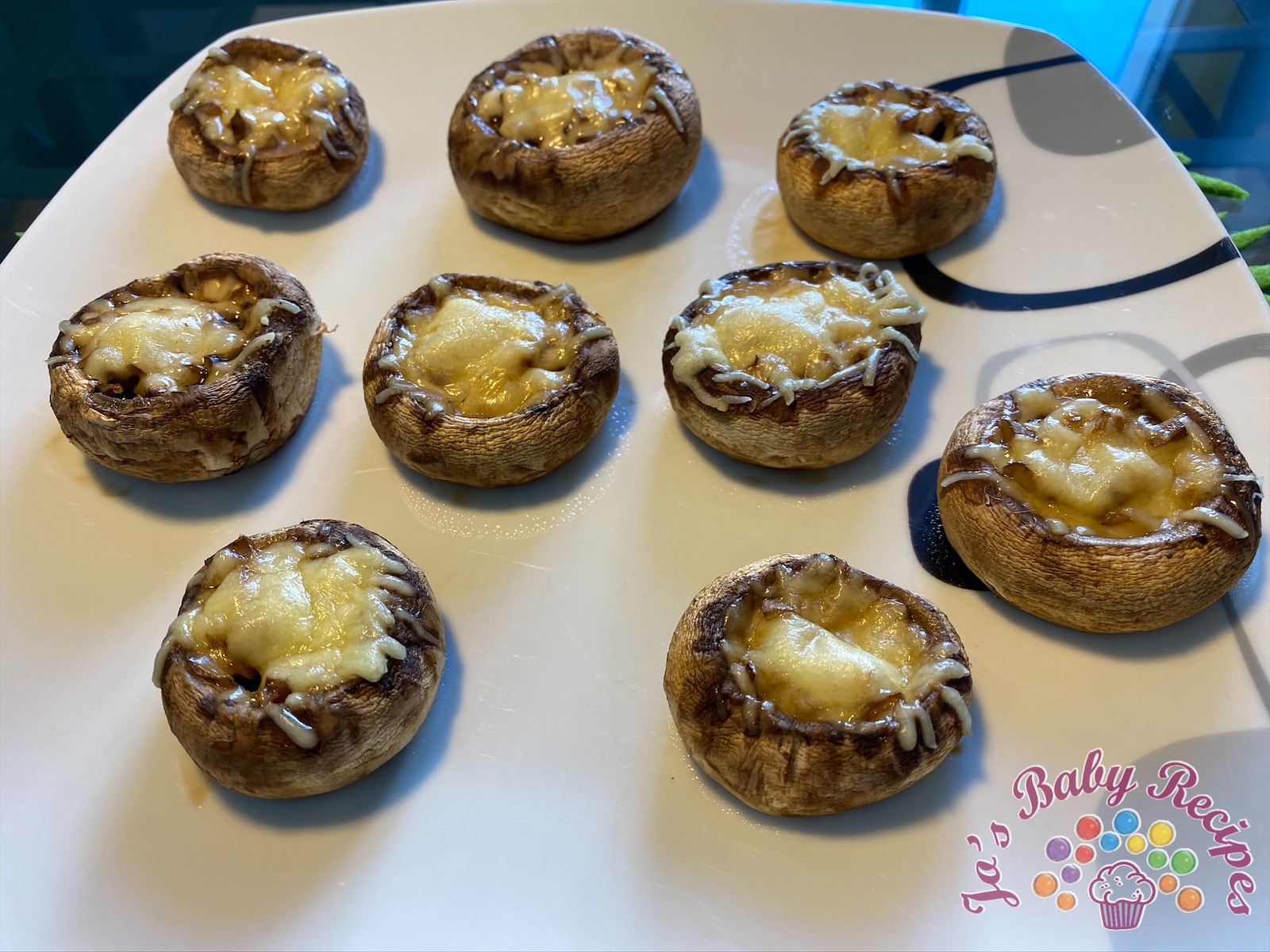 Mushrooms in the oven with yellow cheese and pepper
