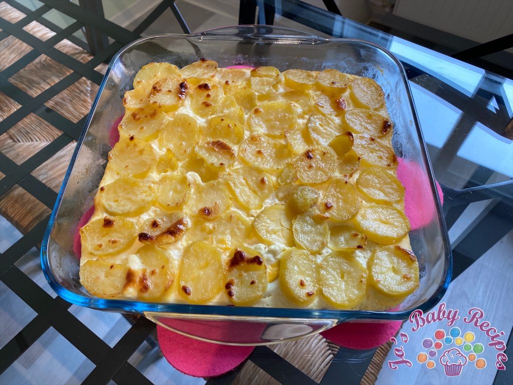 Baby friendly potatoes with eggs, cheese and sour cream in the oven