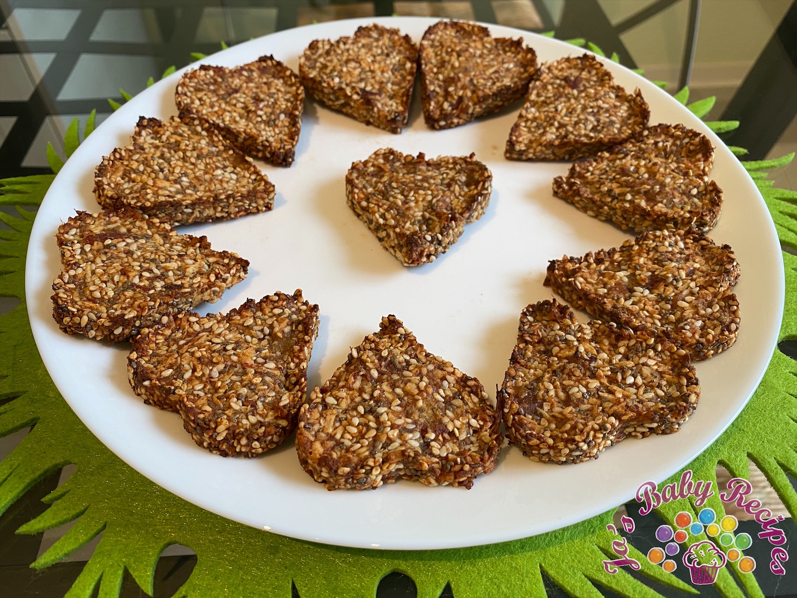 Baby friendly biscuits with dates palm paste, coconut flakes and seeds