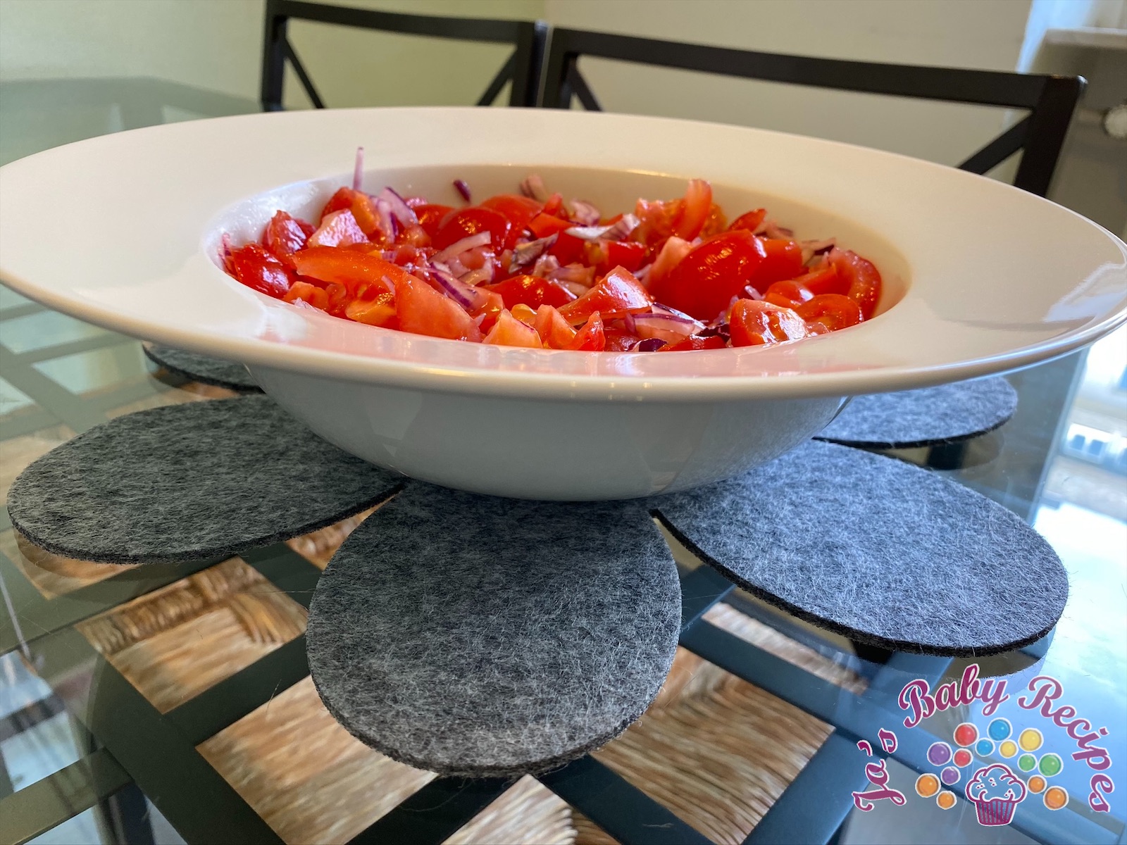 Baby friendly tomatoes salad with red onion