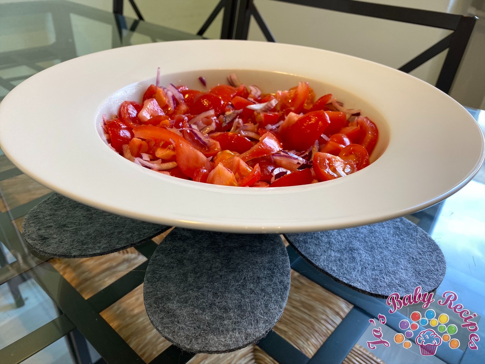 Baby friendly tomatoes salad with red onion