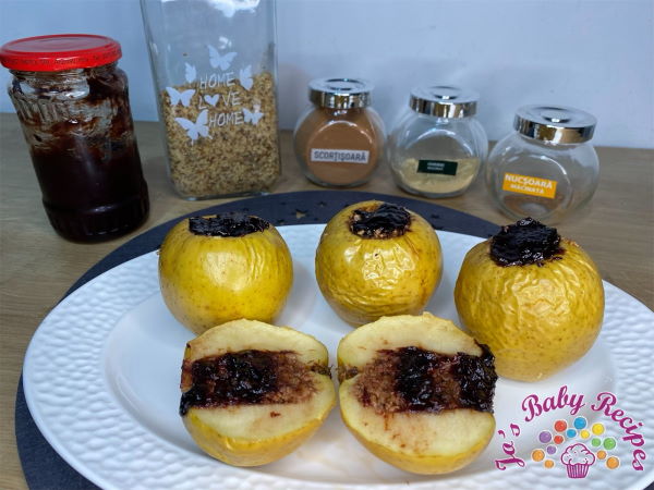 Baked apples stuffed with plum jam and winter spices for babies