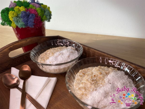 Porridge of oatmeal with coconut flakes for babies
