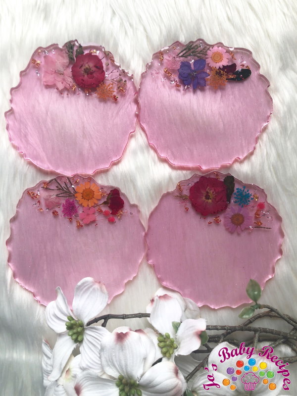 Set of 4 round pink ribs made of resin with flower inserts, PWE-13